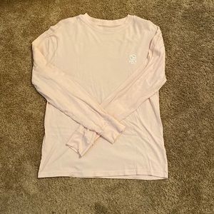 Light pink long sleeve shirt.